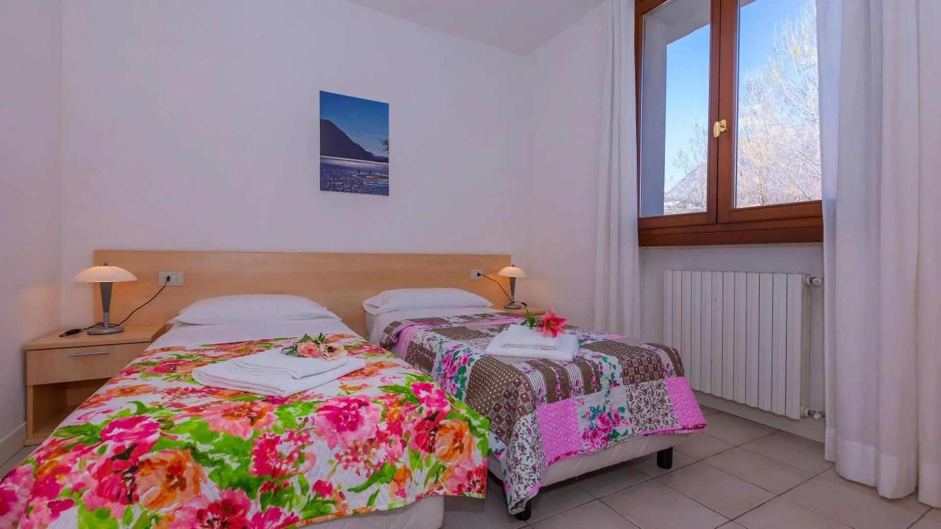 ** Aparthotel Budget Village Apartments - Porto Letizia Porlezza Italië
